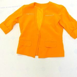 Yellow orange coat,would be great for any age.